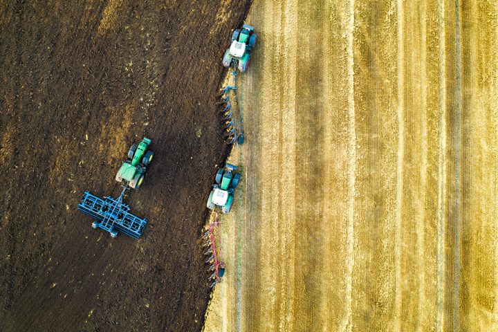 Necessity Or Luxury: Why Farmers Need Broadband Farmers tilling the ground after a harvest
