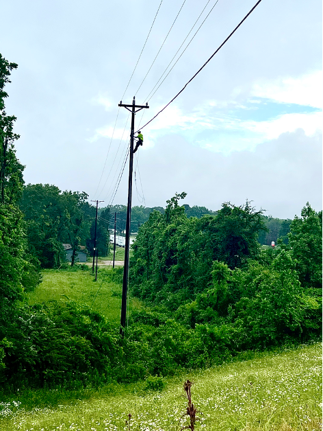 Necessity Or Luxury: Why Farmers Need Broadband National OnDemand aerial lineman works on pole in rural America to help install broadband in rural communities.