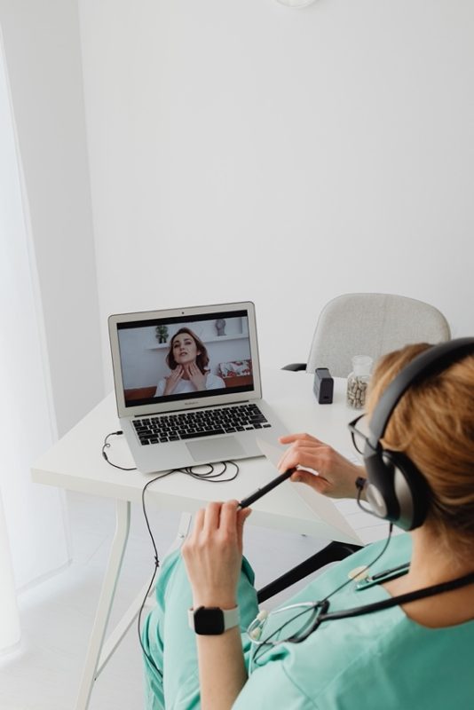 Broadband Networks Accelerate Internet Speeds and Quality of Life Medical professional utilizes broadband access to listen to patient over telemedical service
