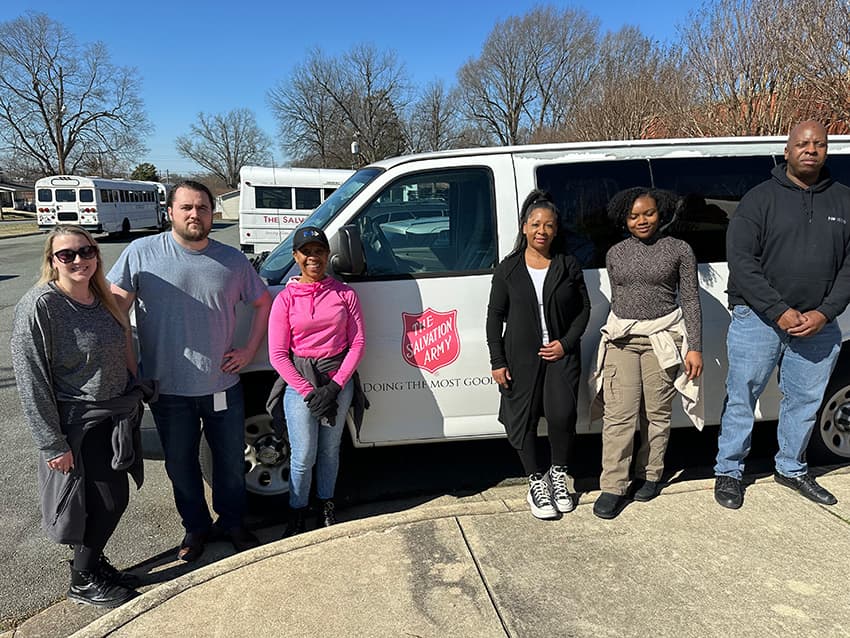 National OnDemand partners with Salvation Army, Second Harvest Food Bank to help feed the hungry Team members from National volunteering were Corrine Dumas, Brian Goodlett, Sharon Fullerwinder, Shonda Seals, Audasia Newsome and Torey Searcy stand in front of Salvation Army Van.