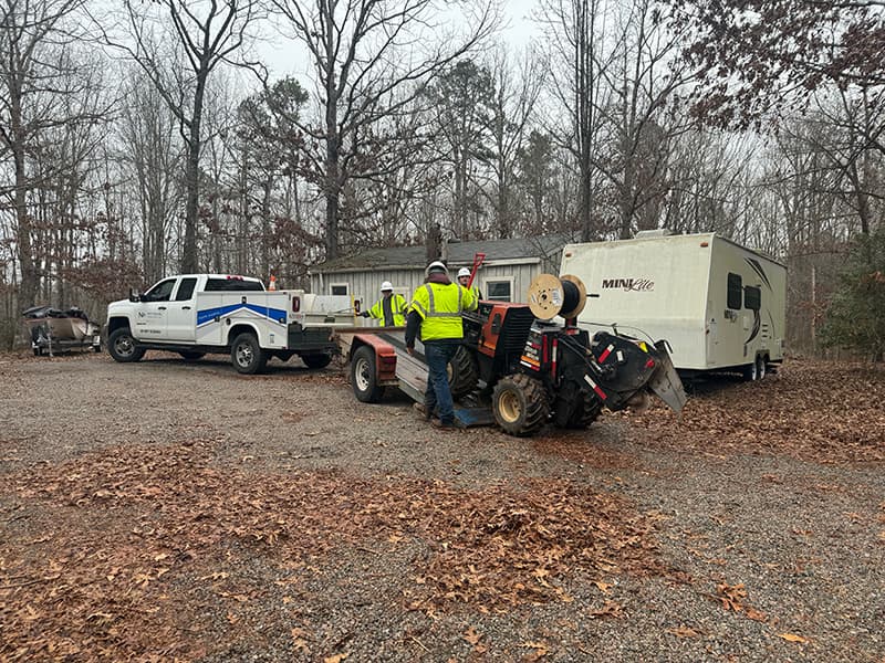 Rural Fiber Construction: 3 Aspects for Innovative Connectivity National OnDemand In house crew loading up drop bury plow after burying fiber to residents. The crew is helping to support an ongoing project for rural fiber construction.